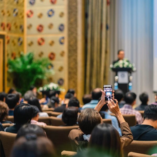 back-side-of-audience-taking-photo-by-cellphone-th-2024-02-23-05-03-57-utc.jpg